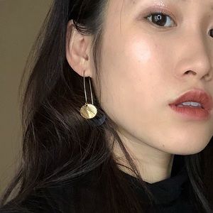 Black and gold earrings
